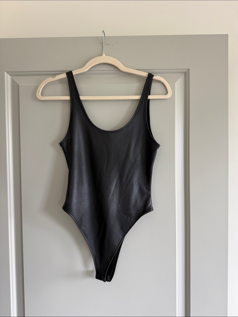Black leather bodysuit